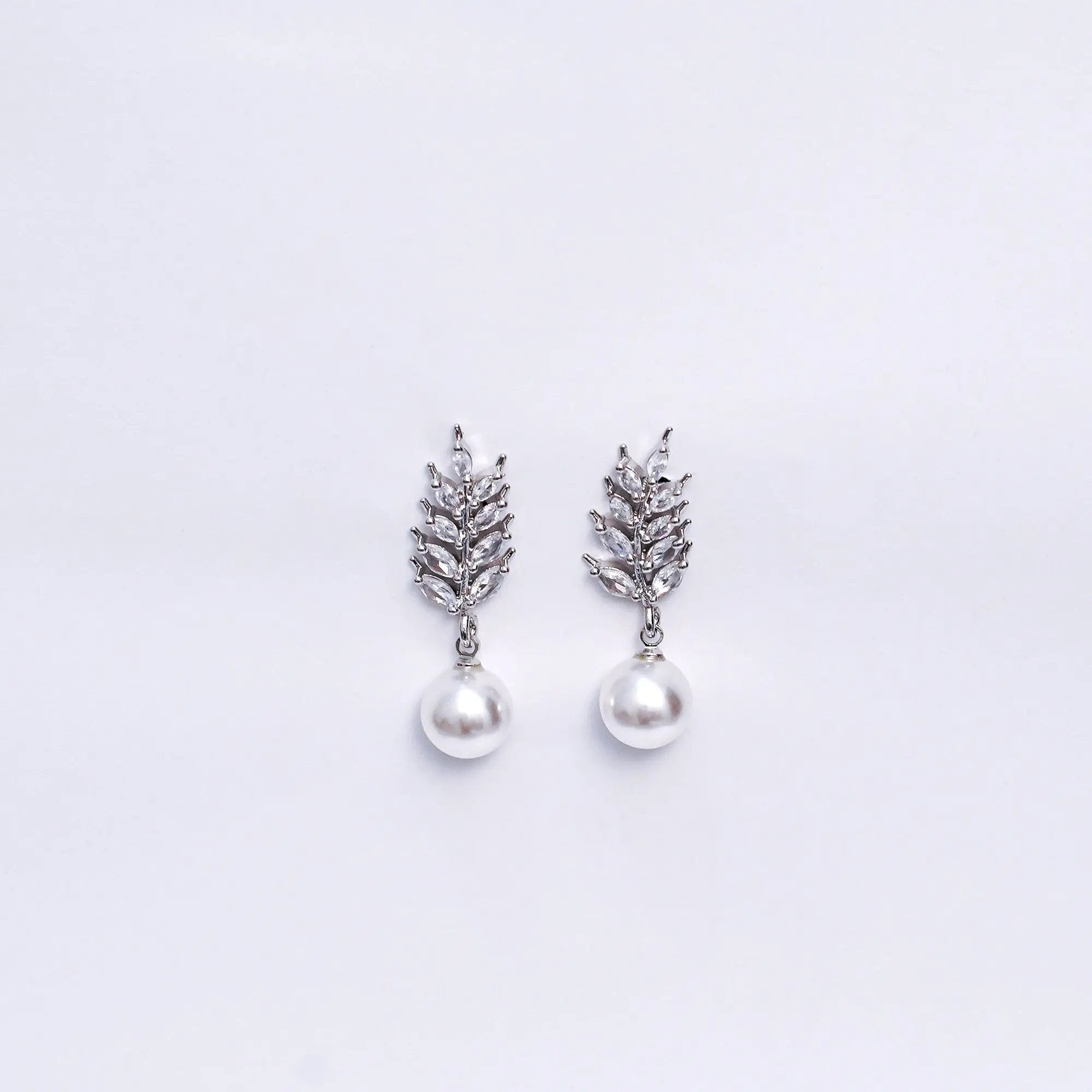 Elegant Silver-Plated Leaf Design Earrings with Pearl Drop β Stylish Party & Wedding Jewelry SIZZLE JEWELS