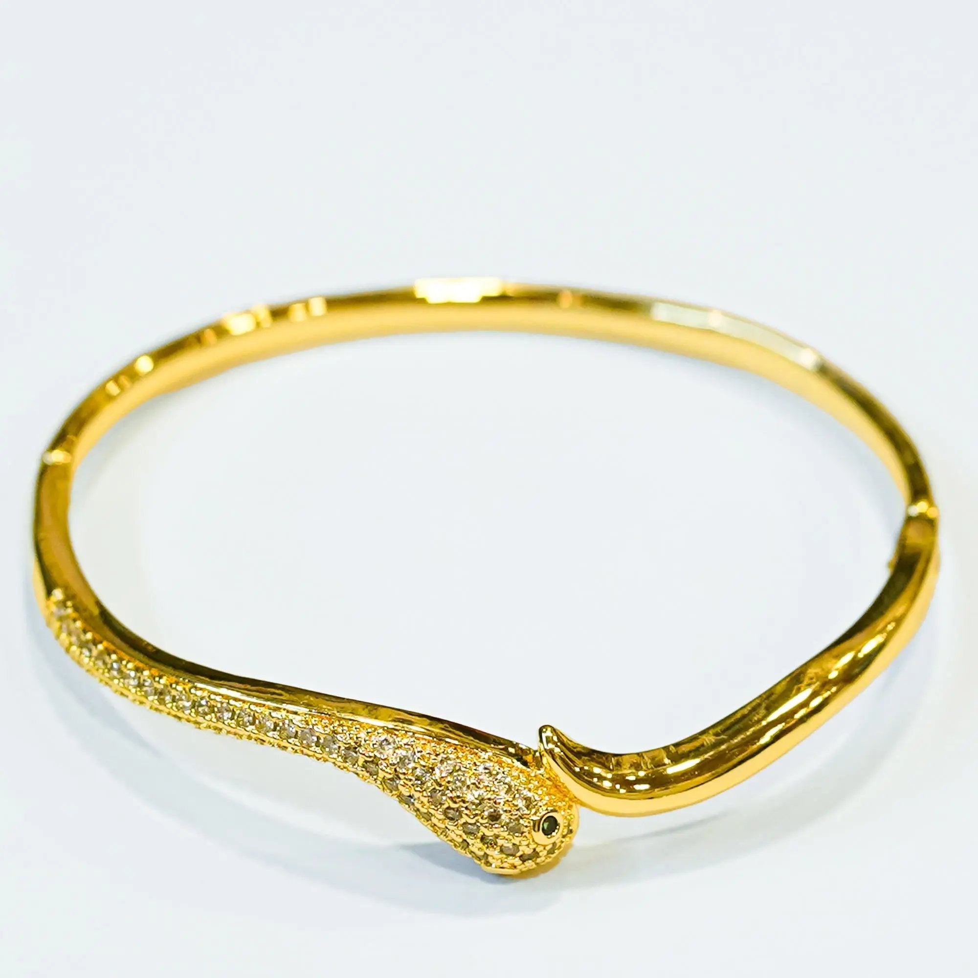 Elegant Gold Snake Design Bracelet with Sparkling Stone Accents SIZZLE JEWELS
