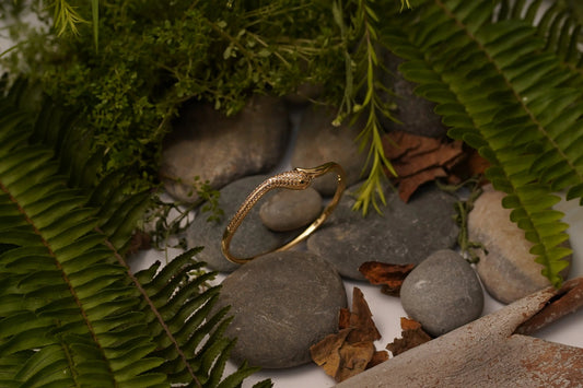 Elegant Gold Snake Design Bracelet with Sparkling Stone Accents SIZZLE JEWELS