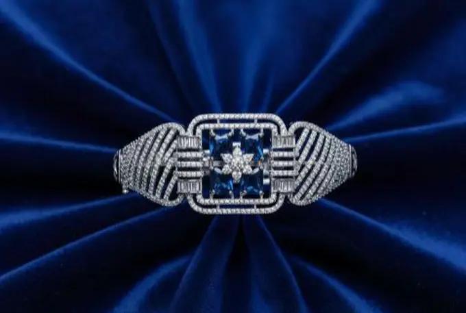 Exquisite American Diamond Free Size Bracelet with Royal Blue Accent