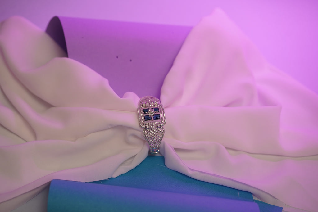 Exquisite American Diamond Free Size Bracelet with Royal Blue Accent