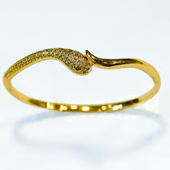 Elegant Gold Snake Design Bracelet with Sparkling Stone Accents