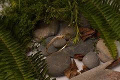 Elegant Gold Snake Design Bracelet with Sparkling Stone Accents